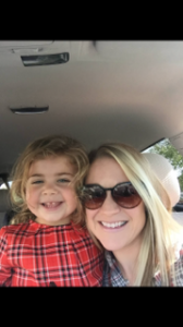 Color photograph of Meredyth Casey and her child